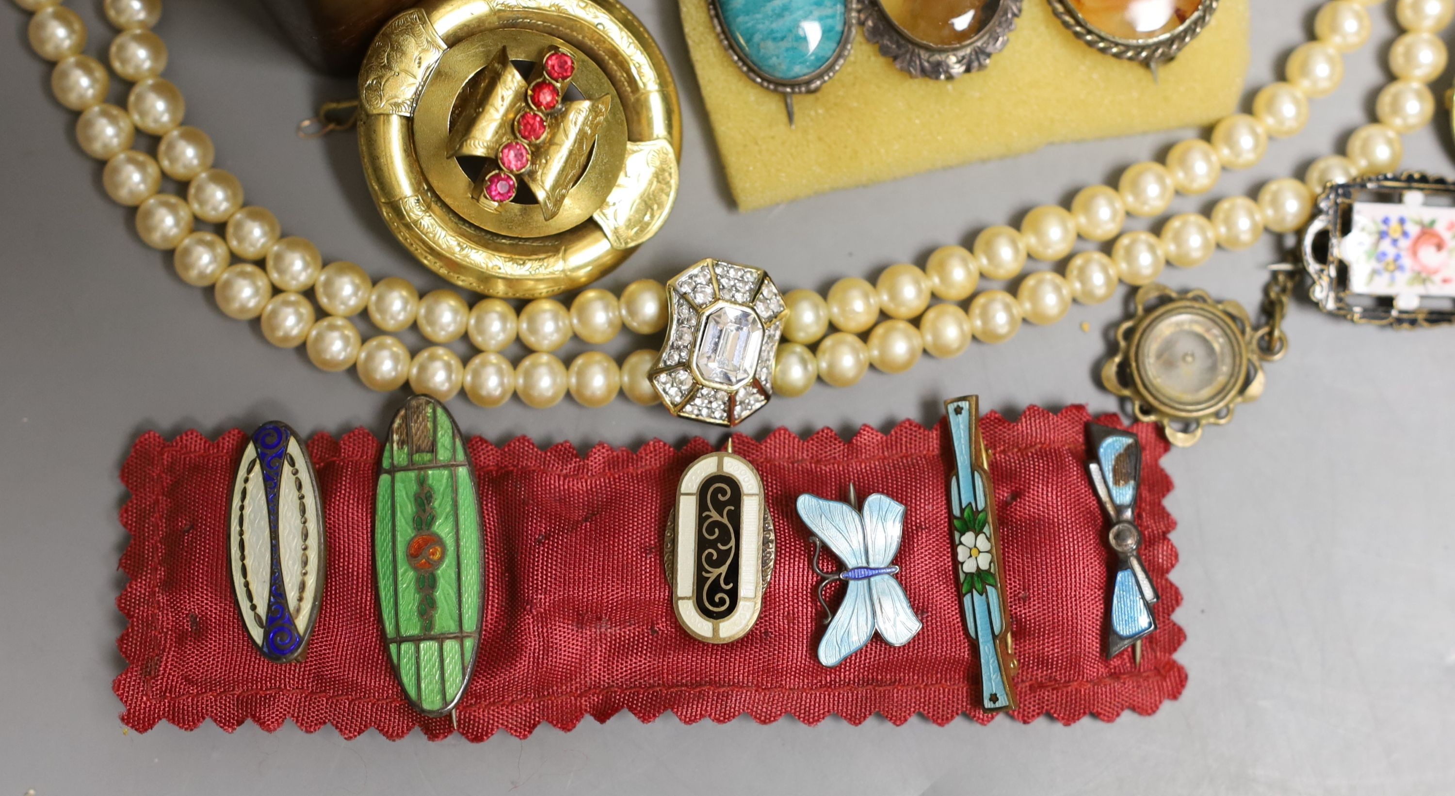A Victorian pinchbeck and paste set brooch and a group of assorted costume jewellery including enamel.